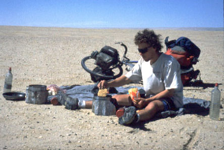 Doug cooking with our <a href="http://www.msrcorp.com/msr/">MSR</a> XGKII stoves near Jinta, China. Those stoves were loud, but they kicked thermal butt. No problems with them, period.